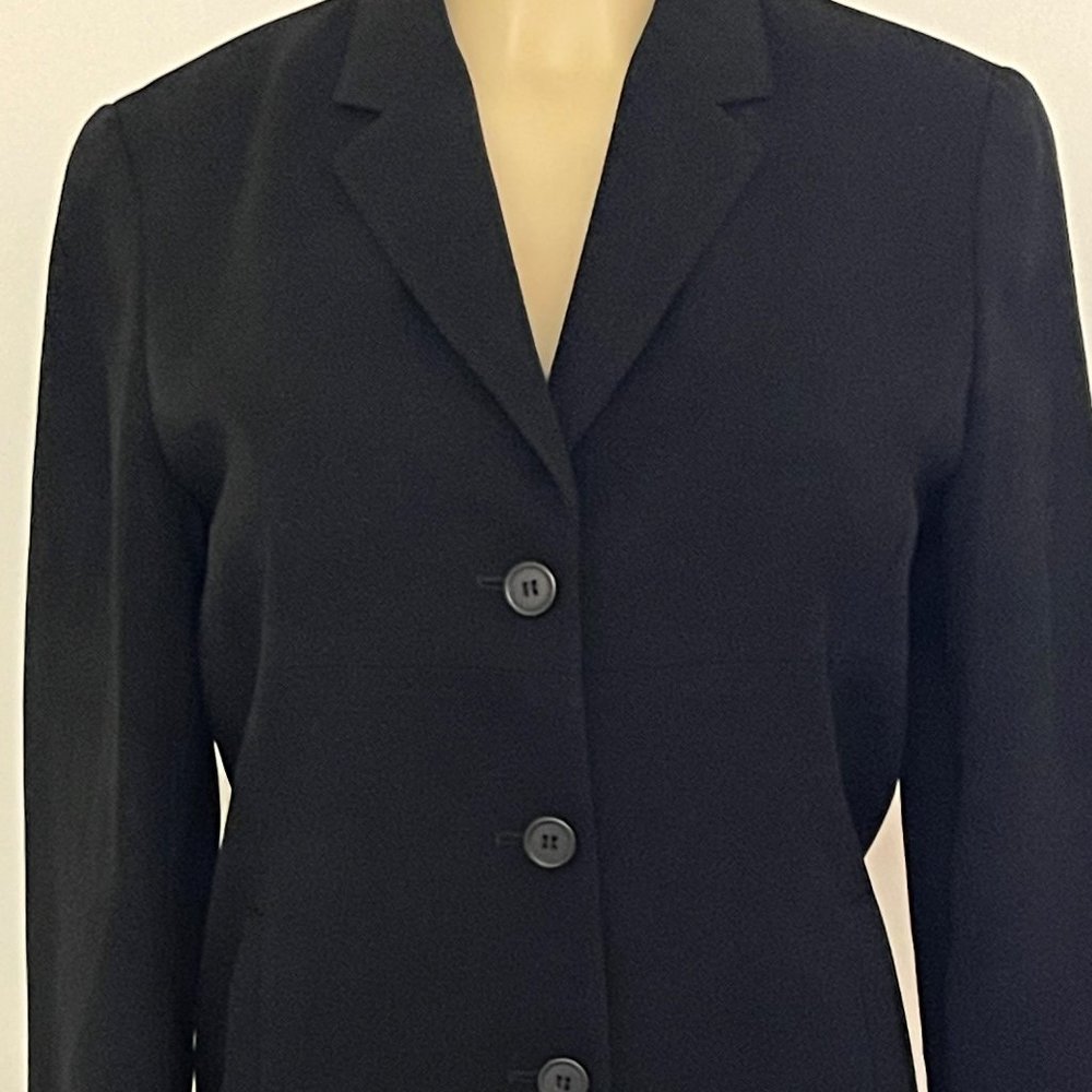 I-N-C International Concepts Women's long-sleeved jacket with shoulder pads.